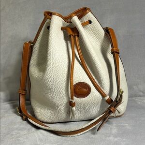 Dooney & Bourke A4 412517 Vintage White and Tan All Weather Leather Bucket Bag